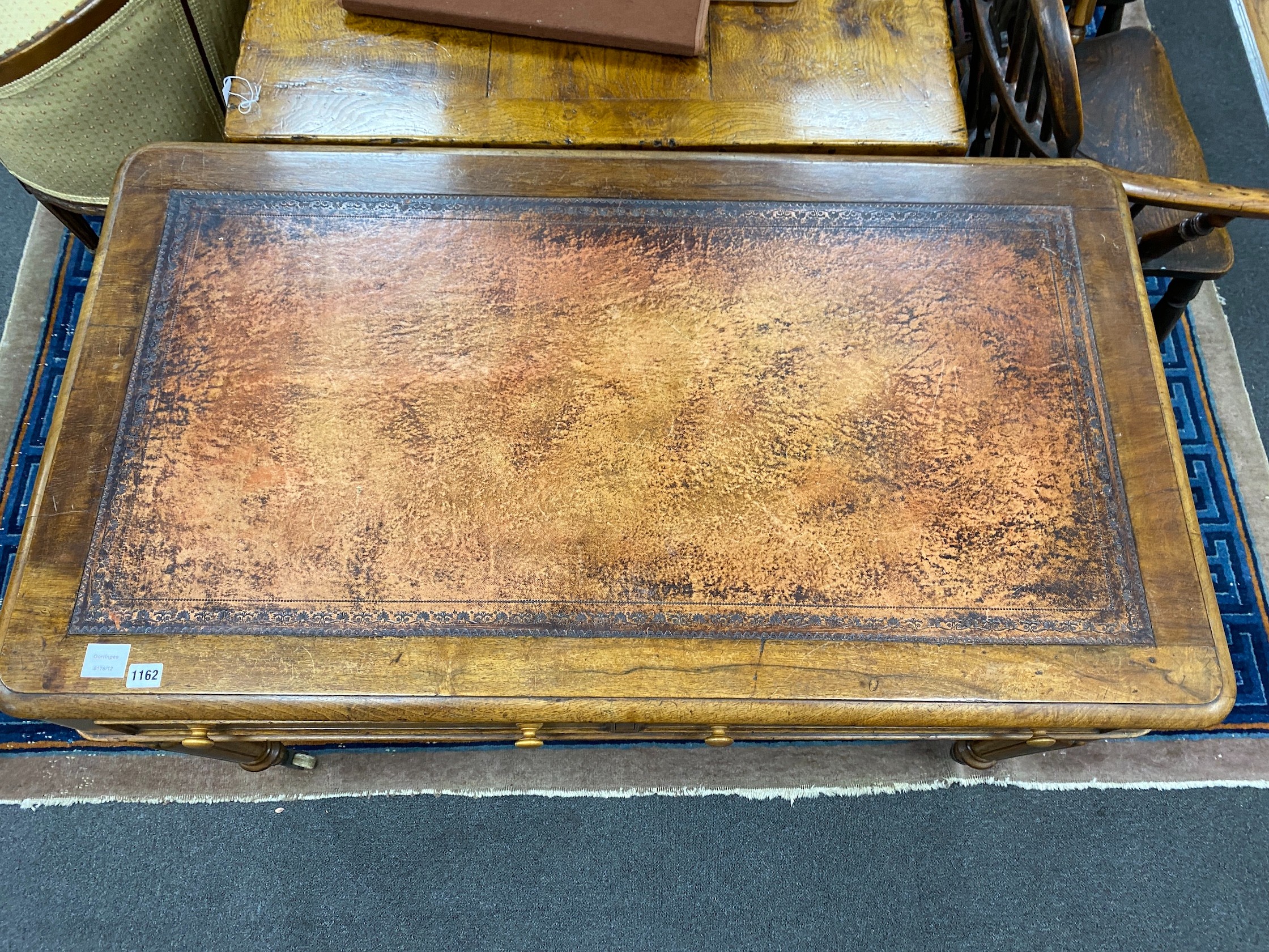 A Victorian mahogany two drawer writing table, width 122cm, depth 68cm, height 77cm